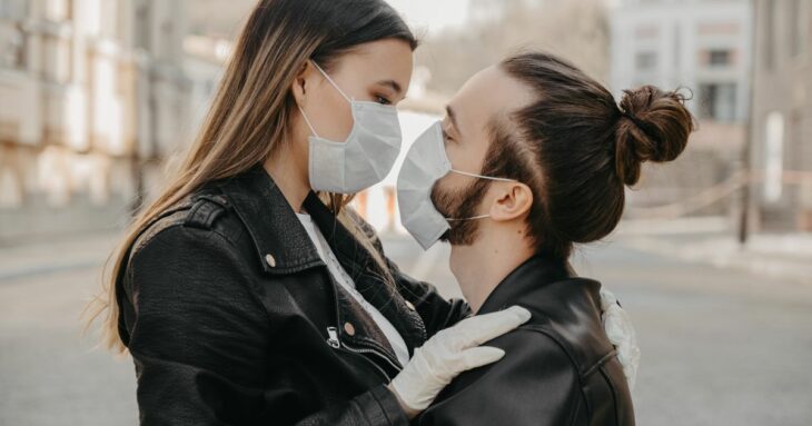 Why are there so many stock photos of people kissing while wearing face masks?