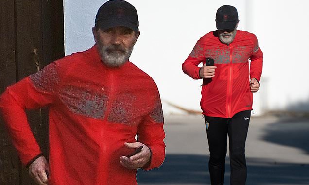 Antonio Banderas dons lycra running gear as he heads out for a jog
