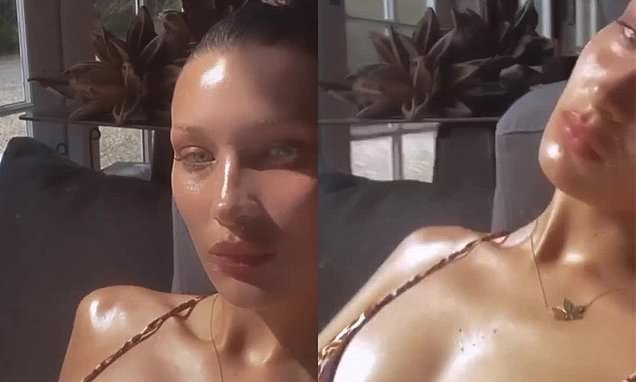 Bella Hadid flaunts cleavage in bikini Instagram clip after sister Gigi’s baby news makes headlines