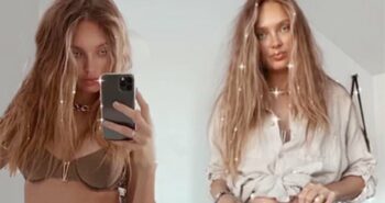 Romee Strijd struggles to button up her jeans while showcasing her burgeoning baby bump