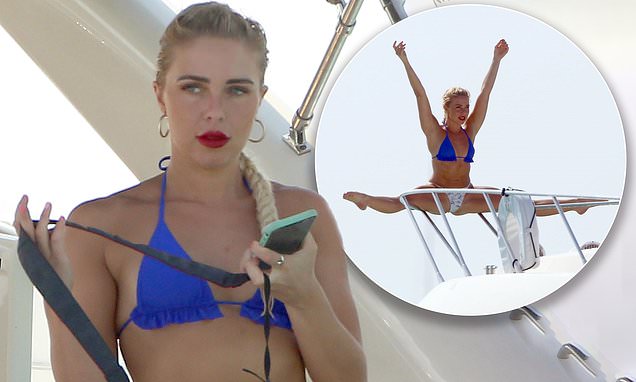 Love Island’s Gabby Allen shows off her impressive gymnastic skills during boat ride in Ibiza