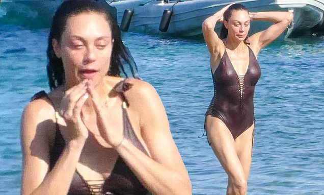Boris Becker’s ex Lilly shows off her sizzling physique in a plunging swimsuit in Sardinia