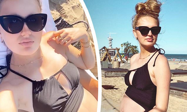 Romee Strijd proudly bares her baby bump in cutaway suit while soaking up the sun on beach trip
